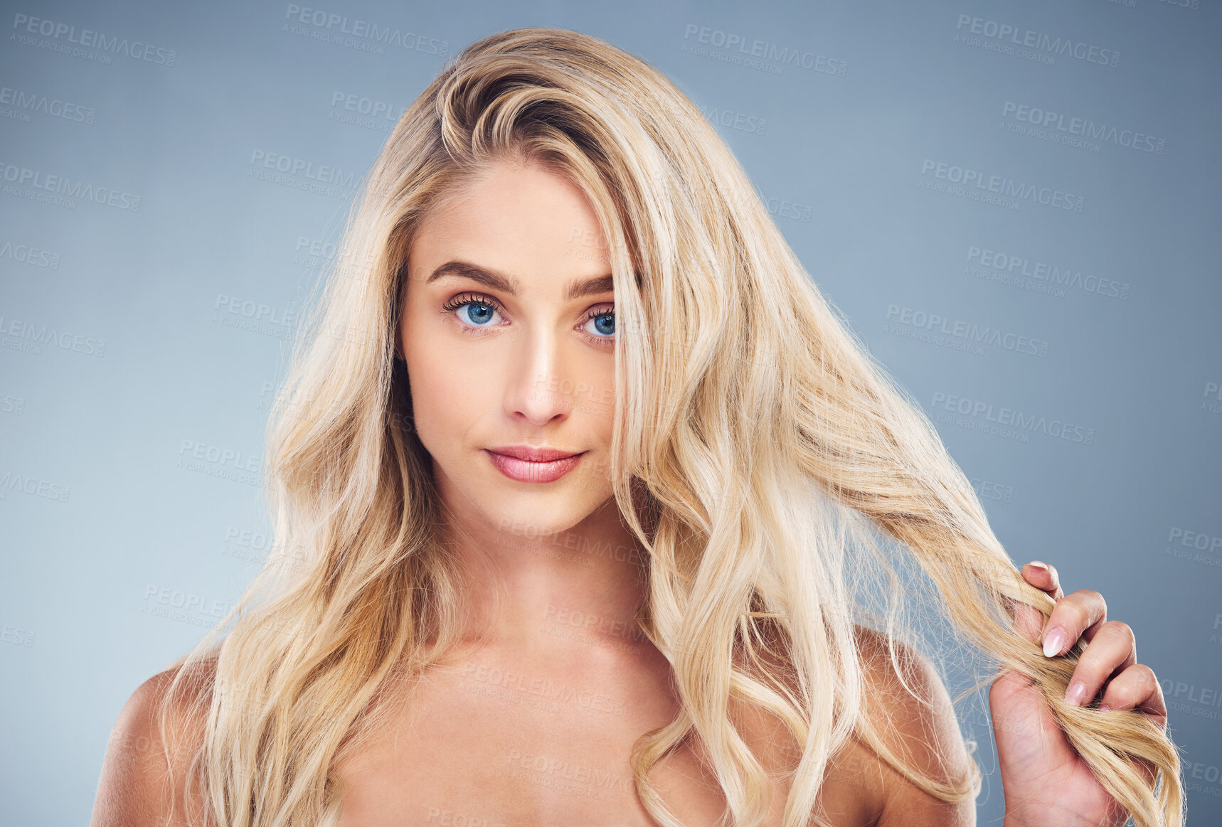 Buy stock photo Woman, blonde, hair care on gray studio background in hair dye advertising, treatment or texture hair style. Portrait, beauty model or face with makeup cosmetics, healthy skincare or long hair growth