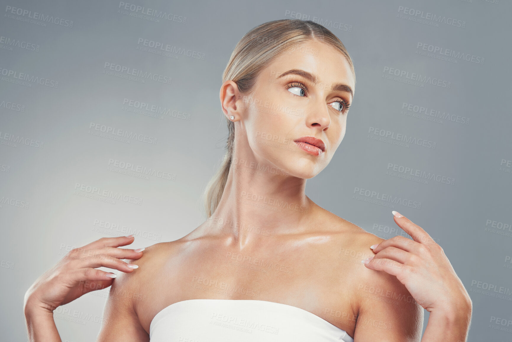 Buy stock photo Skincare, beauty and woman with hands on shoulder model for wellness, spa and body care. Cosmetics, skincare products and female in studio on gray background with perfect, healthy and natural skin