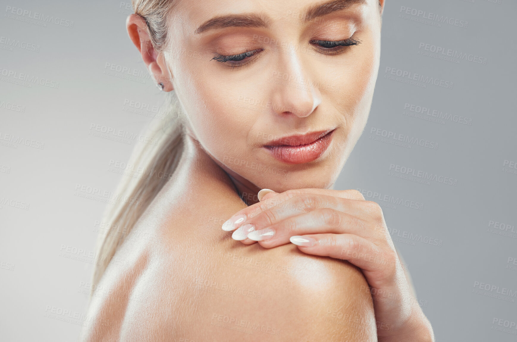 Buy stock photo Skincare, glow and woman with cosmetic beauty, wellness and care against a grey studio background. Shoulder, spa and girl model with self love, confidence and natural dermatology for young skin