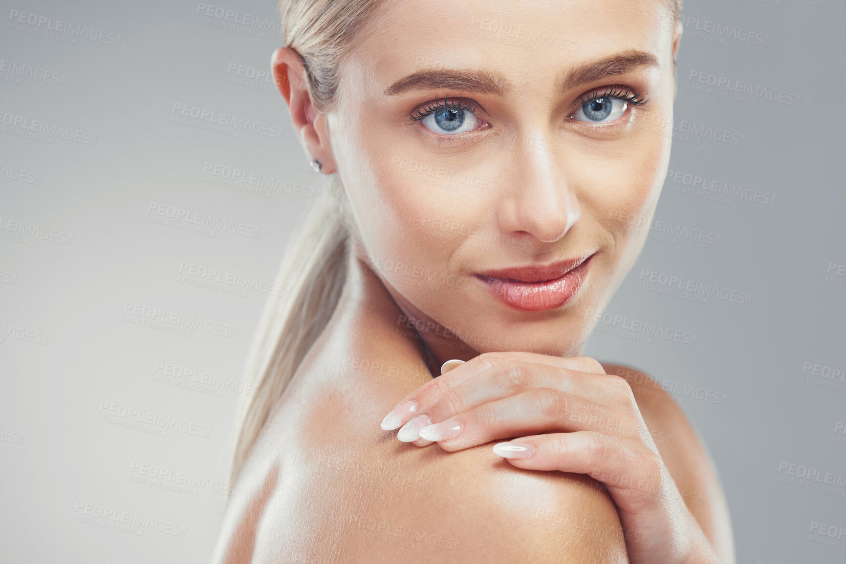 Buy stock photo Skincare, beauty and woman in a studio portrait with blue eyes for cosmetics, aesthetic and facial glow advertising or marketing mock up. Young facial, skin care model in natural makeup for self love