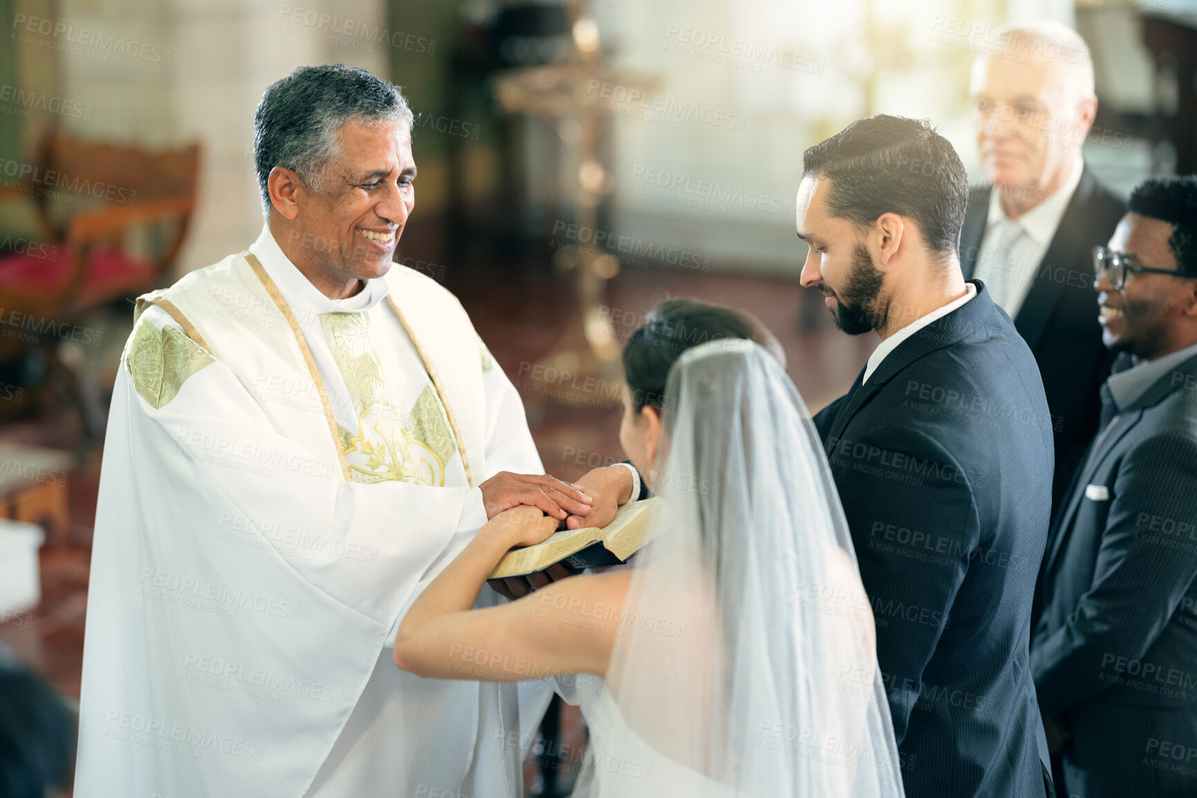 Buy stock photo Happy priest, wedding and couple in church for ceremony, service or celebration with bible, witness and God. Father, bride and man with spiritual book for love, vows and marriage in christian event