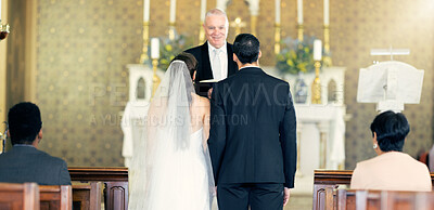 Buy stock photo Couple, wedding and priest with commitment, love and marriage ceremony in church service together. Man, woman and pastor with trust, celebration and christian marry event in a chapel or spiritual 