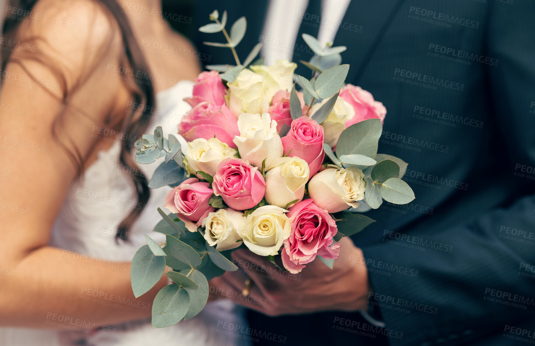 Buy stock photo Flowers, wedding and love with a bouquet in the hands of a bride and groom on their marriage day closeup. Rose, married and celebration event with a floral arrangement in hand during a ceremony