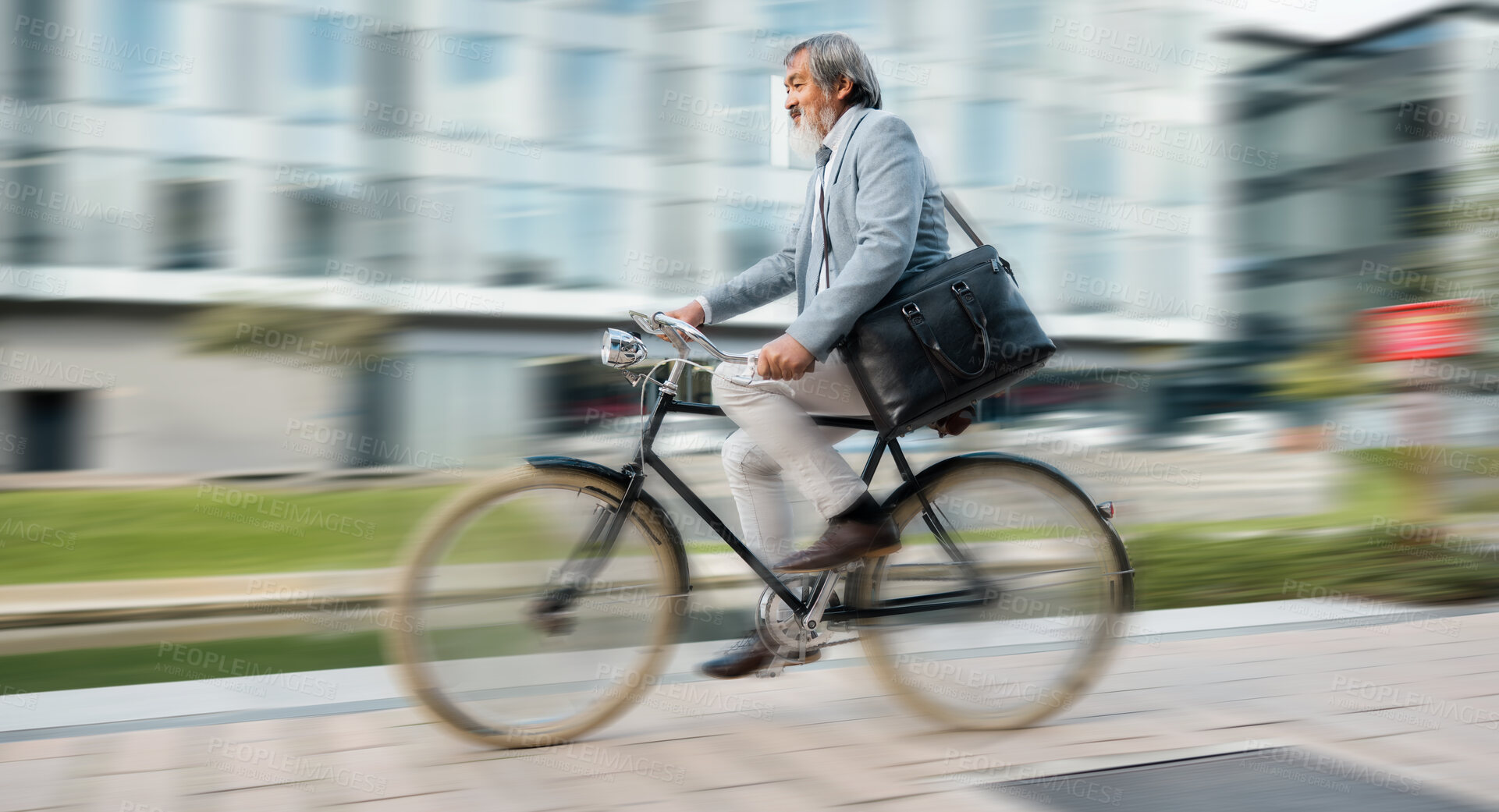 Buy stock photo Bike, commute and blurred motion with a mature man in business cycling in the city on his morning trip into work. Road, travel and bicycle with a senior male employee riding on a street in town