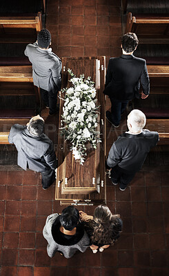 Buy stock photo Funeral, coffin and family mourning death of loved one, death and carrying wood casket in church for faith wake, eulogy and memorial. Pallbearers, spiritual grief and sad friends burial flower wreath