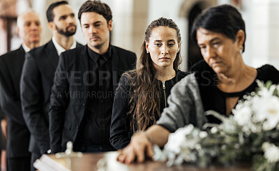 Buy stock photo Funeral, goodbye and family with a coffin in a church during a service in death, mourning and grief. Respect, greeting and sad people in a row with a casket in a cathedral for a burial or memorial