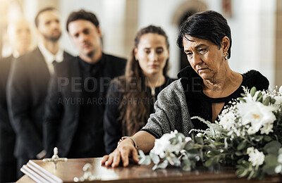 Buy stock photo Funeral, death and coffin in church or Christian family gathering together for support. Religion, sad people and mourning loss or religious catholic men and women grief in church service over casket