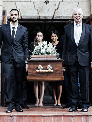 Buy stock photo Funeral, church and people with a coffin, family and mourning in emotional distress. Church service, casket and burial with sad men and women carrying dead person together out of a chapel door