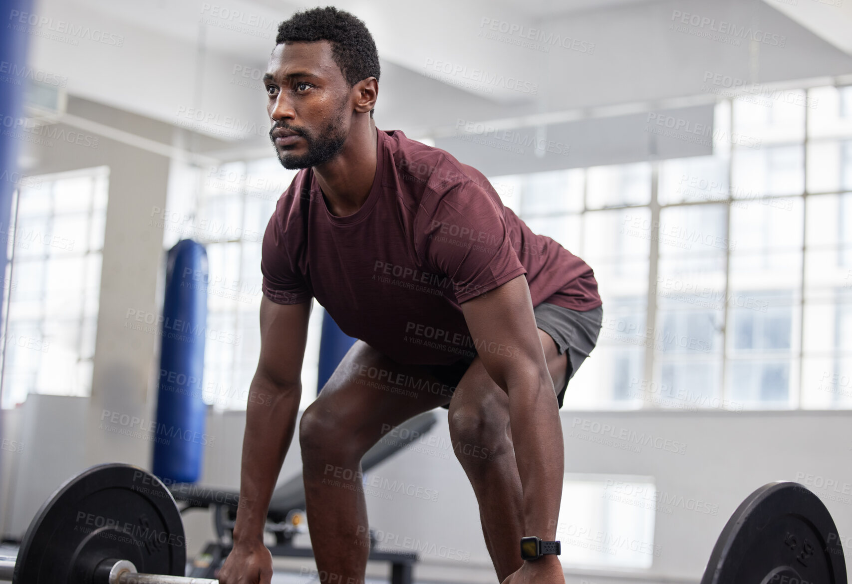 Buy stock photo Weightlifting, fitness and man at gym for training, health and exercise, energy and bodybuilding. Bodybuilder, weights and black man with strong mindset focused on cardio, biceps and body workout