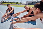 Fitness, stretching and running with women on stadium track for training, health and workout. Wellness, exercise and sports warm up with runner friends on ground for cardio, endurance and performance