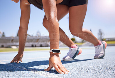 Buy stock photo Hands, race and runner with a sports woman on track ready to start an endurance or cardio workout for competitive training. Smartwatch, fitness and exercise with a female athlete running for sport