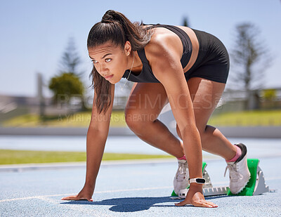 Buy stock photo Runner, fitness and woman ready to run race, exercise and running on stadium track for sport and workout. Young athlete, cardio and focus, training for marathon or relay, determined at start.