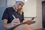 Woman, sport coach and clipboard writing of an athlete writing exercise schedule or plan. Personal trainer or gym fitness instructor planning a sports class, wellness balance and team class data