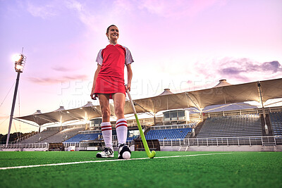 Buy stock photo Sports, hockey and girl in outdoor stadium ready for game, match and practice in evening. Fitness, motivation and young woman on field with hockey stick and ball, doing exercise, workout and training