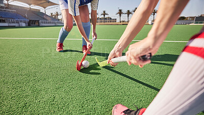 Buy stock photo Sports game, field hockey and women challenge for ball in dynamic club competition, workout performance or practice match. Fitness exercise, training action and athlete battle tackle on stadium turf