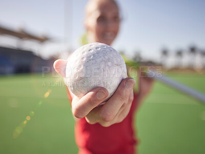 Sport, ball in hand and hockey on field with athlete and fitness outdoor for training on stadium turf. Hockey player, workout and sports closeup, field hockey and active with healthy lifestyle.