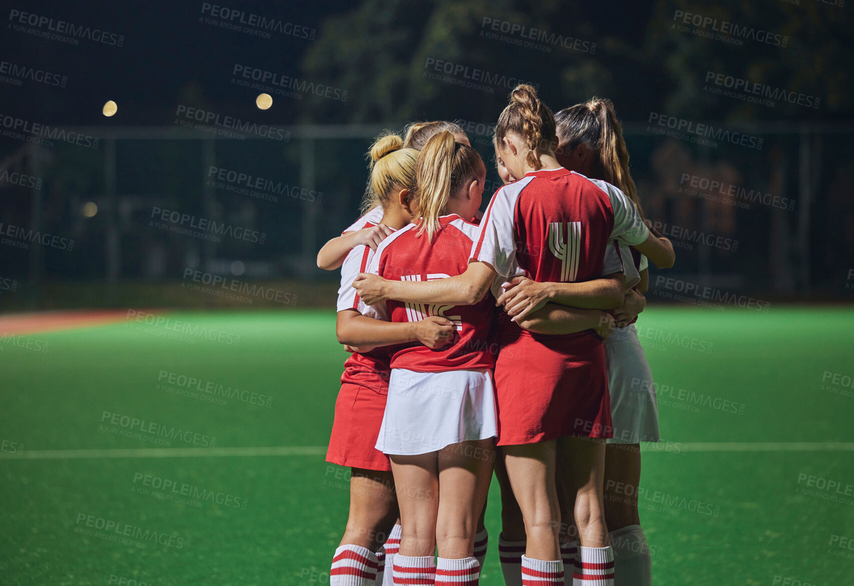 Buy stock photo Huddle, soccer teamwork or football women on soccer field or stadium at night for support, motivation or workout game. Fitness, wellness or sports health trust, game partnership or planning on field