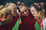 Women, football and team huddle on field at soccer game, motivation and team building for girl sports. Fitness, training and happy girls talk at soccer match in support of winning teamwork and goals.