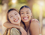 Asian, women friends and happy portrait in outdoor sunshine with embrace, hug and smile in summer. Happy diversity, best friends and happy with happiness in metro together on vacation in Jakarta