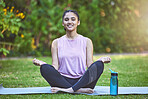 Meditation, fitness and wellness with a woman athlete on an exercise mat in nature for a zen lifestyle. Yoga, health and training with a female yogi meditating outdoor for balance or inner peace