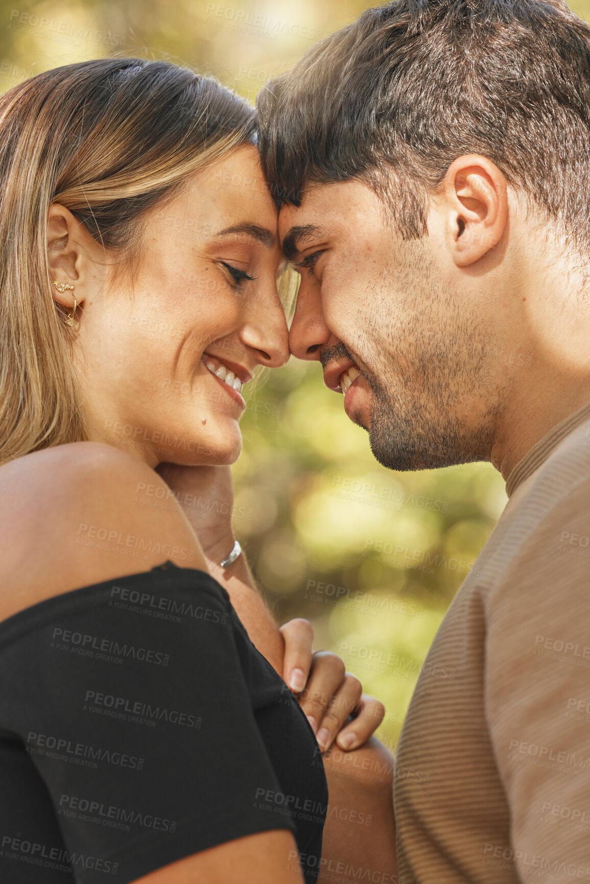 Buy stock photo Couple, love and nature park while outdoor for quality time, commitment and trust being intimate, happy and intimate. Face of man and woman travel together to hug, kiss and relax on vacation