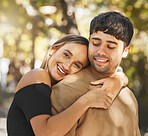 Love, couple and hug being happy, smile and romantic for relationship, bonding and outdoor together. Romance, man and woman embrace, being loving and connect for happiness, passionate and content.