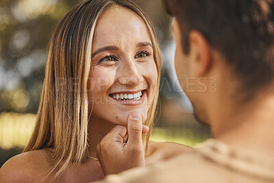 Buy stock photo Love, man touching woman chin for happiness, intimacy and bonding being loving, happy or smile together. Romance, couple or connect for relationship for quality time, passionate or embrace on holiday