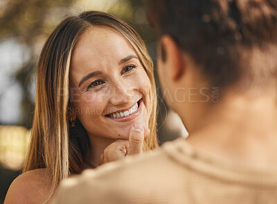 Buy stock photo Happy, girlfriend and face touch of a woman with a smile, love and care looking at her boyfriend. Happiness, bonding and relax feeling together of a couple with trust, commitment and romance