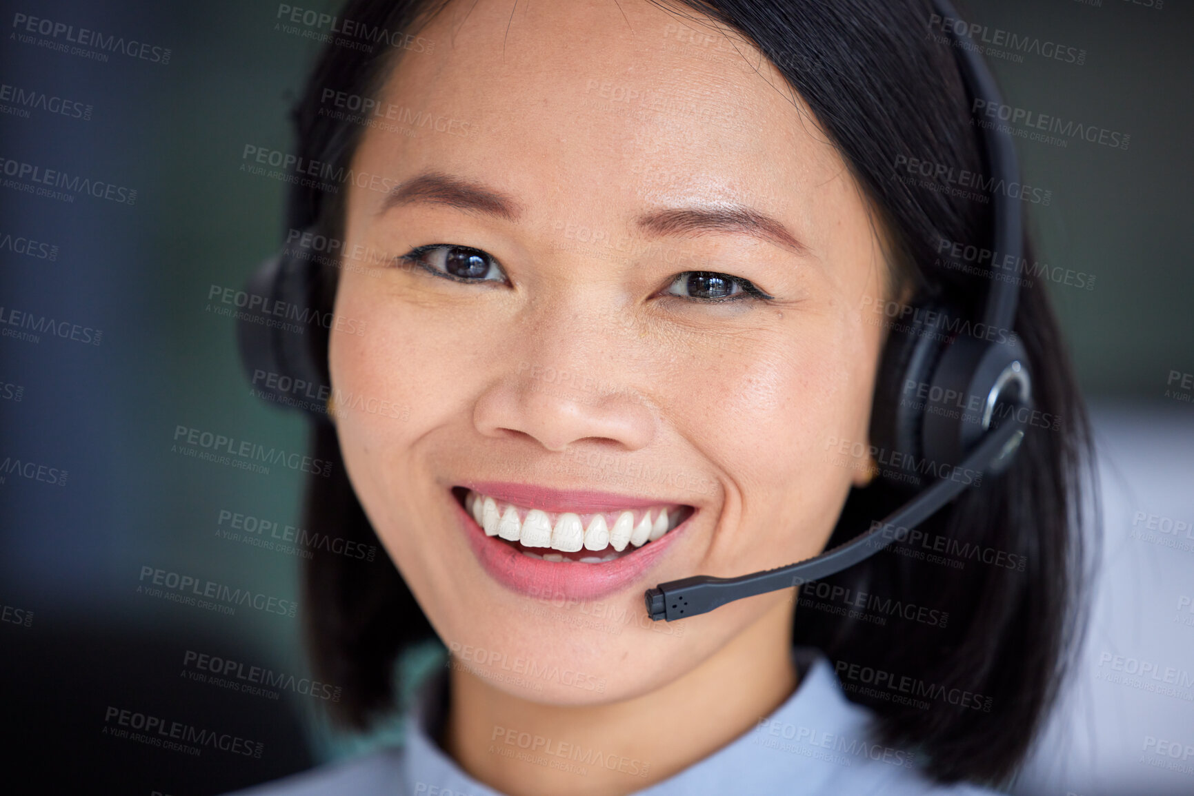 Buy stock photo Face, telemarketing and customer support working in a call center with happy smile. Asian customer service operator with headset consulting, help and online advice for contact us, crm and consultant