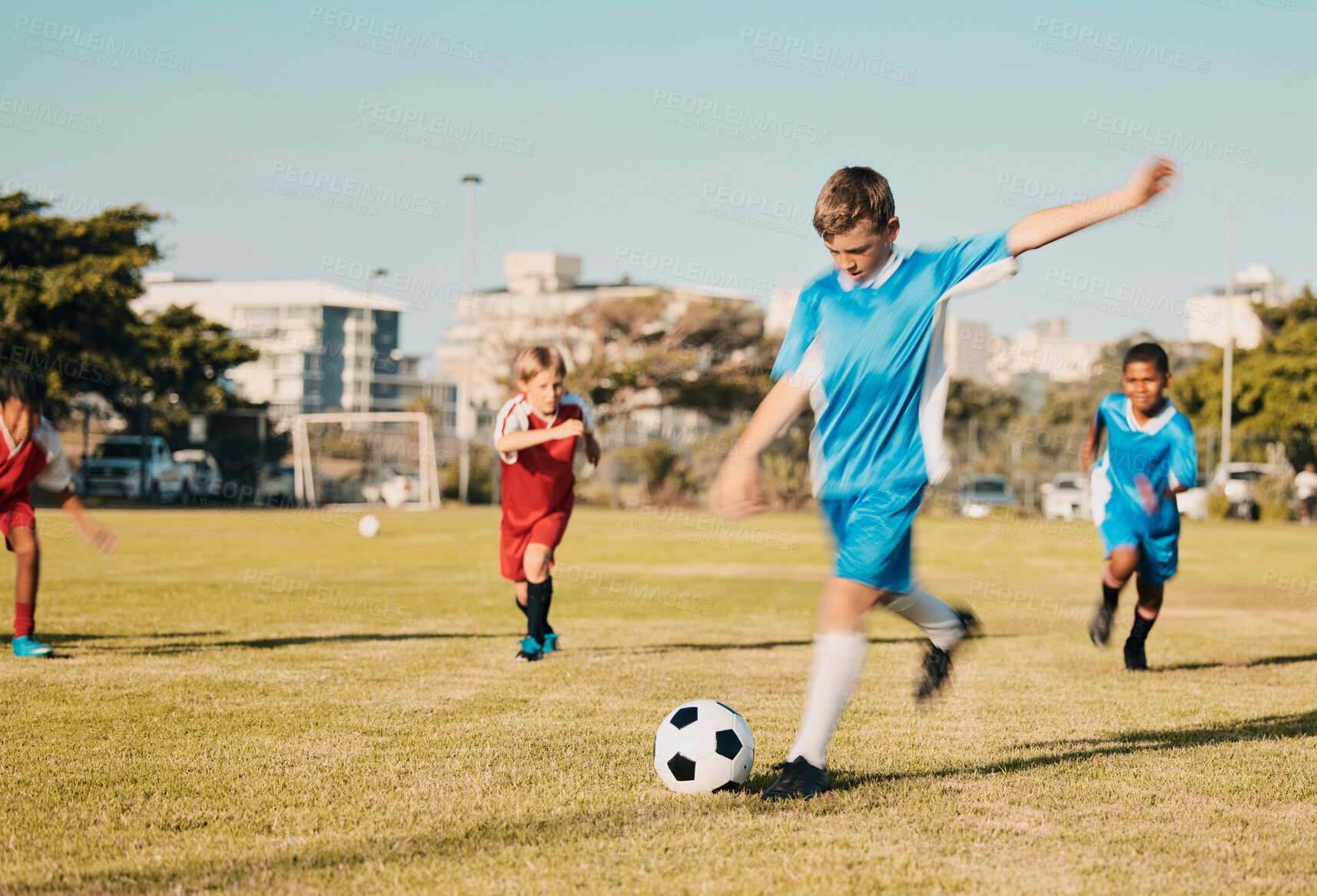 Buy stock photo Soccer, boys running and kicking ball on field in summer, motivation and sports workout goals. Football, teamwork and growth, children playing game on grass soccer field in urban park with kids team.