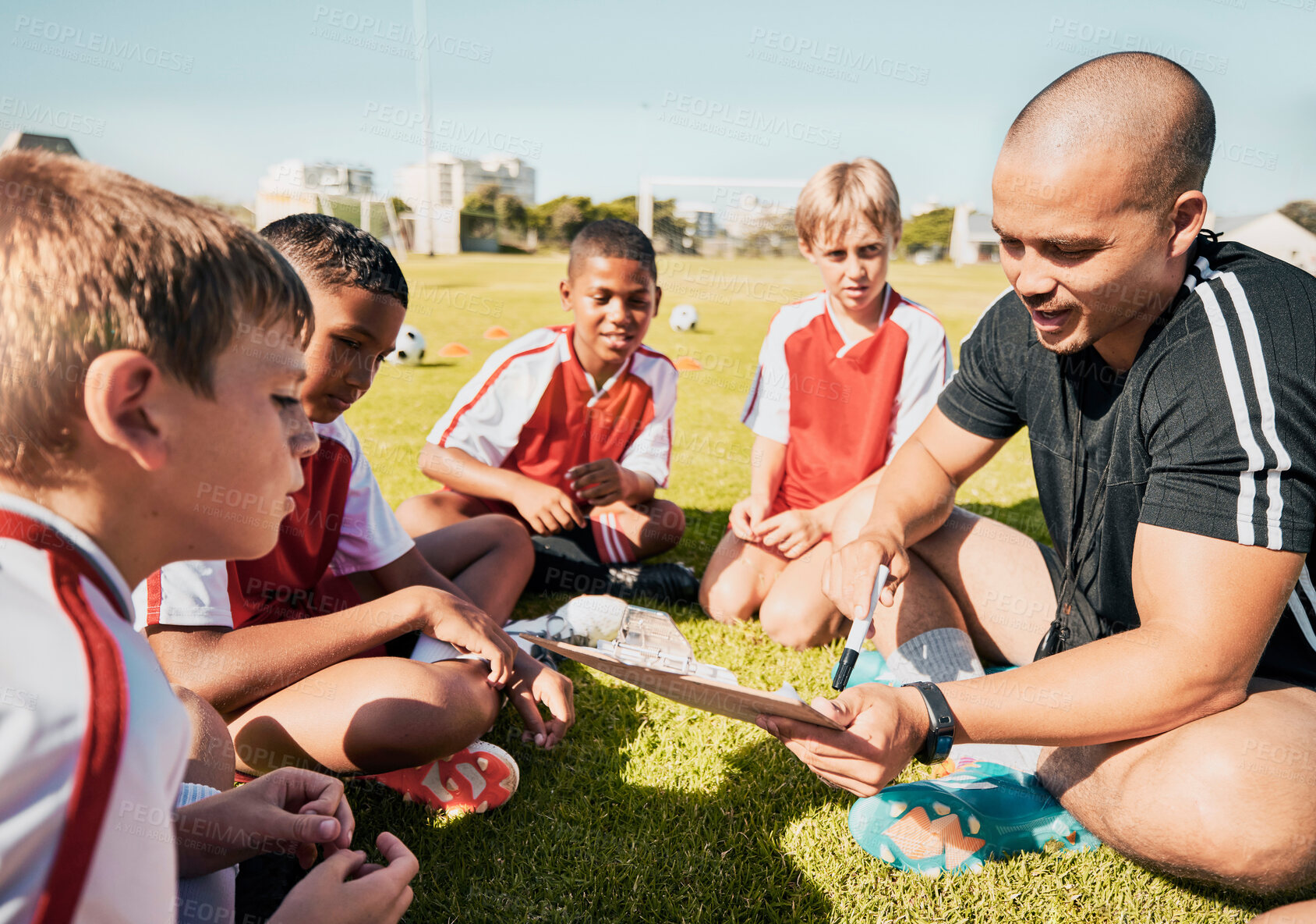 Buy stock photo Soccer, football coach with team talk and strategy with tactics winning game sitting on grass training field. Boy children athletes, teamwork and motivation to win youth kids sport competition match 