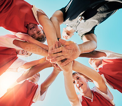 Buy stock photo Hands, collaboration and children with a team in sports together standing in a huddle or circle from below. Soccer, fitness and collaboration with kids motivation before a game or match outdoor