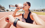 Woman, drinking water or checking smart watch on running track workout, training or exercise break. Runner, sports athlete or fitness person with smartwatch health or time tracker for health or speed