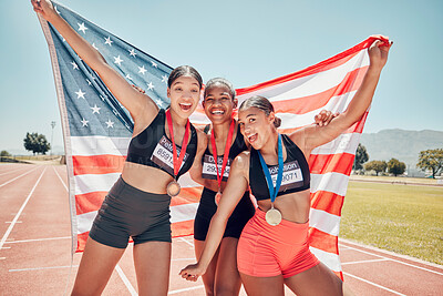 Buy stock photo Winner, women and medal with American flag in celebration, goal or sports achievement on circuit. USA flag, runner group and athlete girl with happiness for running, sport or winning competition