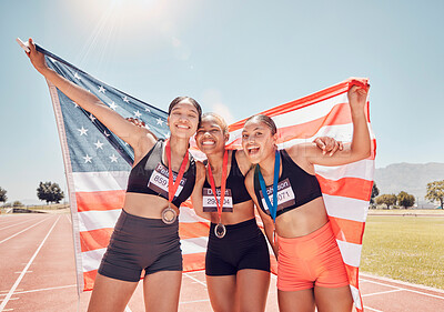Buy stock photo Winner, sports and usa with a woman team holding a flag after winning a race on track for competition. Fitness, teamwork and diversity with an American female group in celebration of victory together
