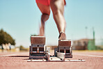 Stadium, back view and runner on start blocks for sprint, race or competition outdoors. Sports, woman or black female sprinter running with energy, speed or strength for fitness, training or marathon