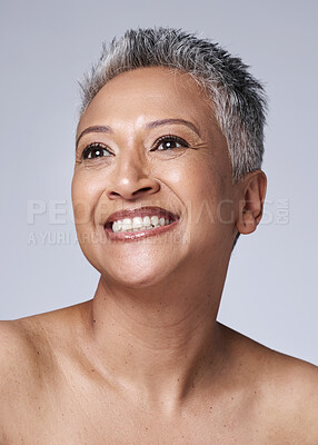 Buy stock photo Mature woman, face or skincare glow on studio background or gray hair, health wellness or makeup cosmetics. Smile, happy or Indian beauty model or facial texture, dermatology or collagen in self love