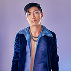 Asian man, makeup and punk fashion for portrait in studio with cyberpunk, creative or aesthetic face. Futuristic model, metal jewellery or clothes with art, cosmetic or beauty by lavender background