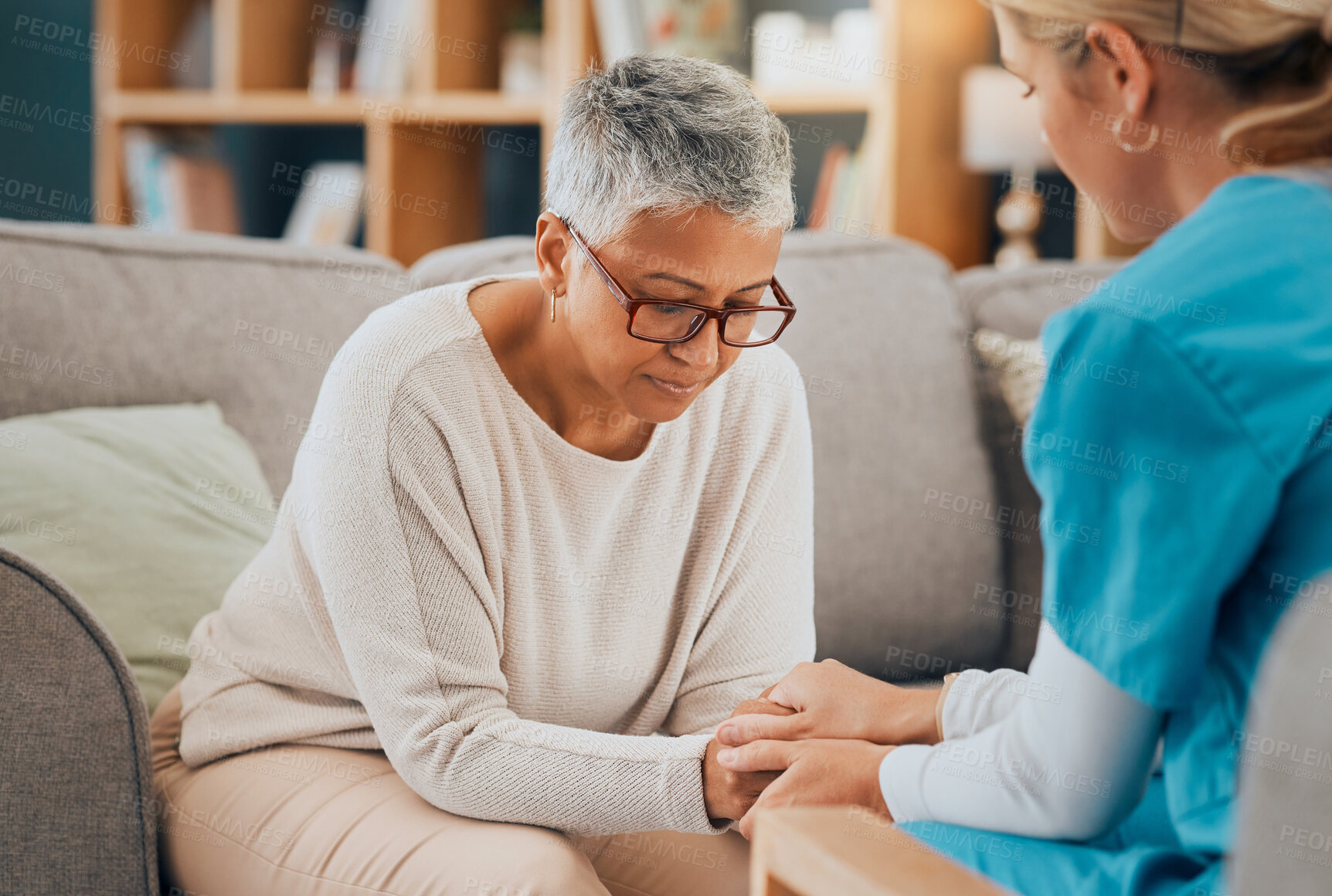 Buy stock photo Mental health, support and nurse with senior woman holding hands for support, healthcare and depression expert advice. Retirement empathy, psychology help and sad elderly patient talking to caregiver