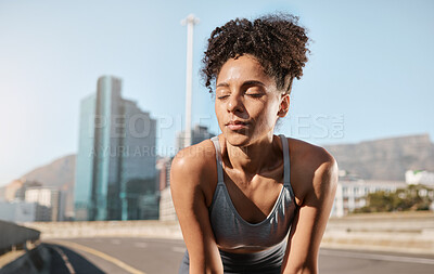 Buy stock photo Fitness, tired woman and runner on a break in the city after running exercise, training or cardio workout in the outdoors. Exhausted female taking a breath from exercising or run in a urban town