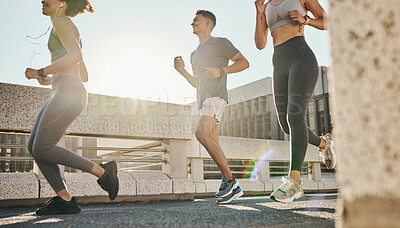 Buy stock photo City, fitness and friends running on a road for a cardiovascular workout, exercise and marathon training. Runners, man and healthy sports women enjoy a morning jog on a bridge together as a group 