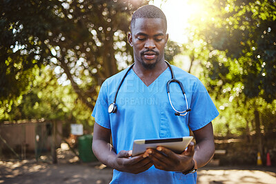 Buy stock photo Veterinary doctor with tablet outside, pet healthcare and black man checking charts and patient info online. Technology, internet and animal care, man working at animal shelter in vet outdoor yard.