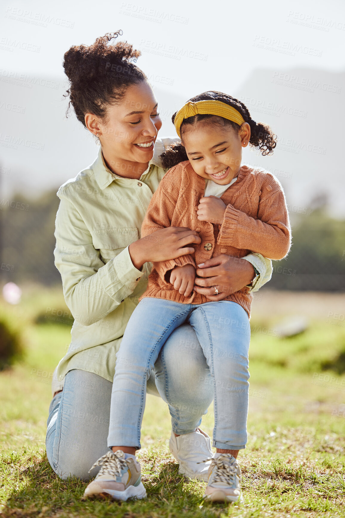 Buy stock photo Love, family and mother and girl in a park, laugh and embrace while play, relax and having fun in nature. Happy family, mom and child enjoy quality time, game and playful in a forest in brazil