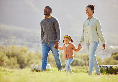 Buy stock photo Happy family, walking and relax at a park with girl and parents, holding hands and enjoy their bond, freedom and trust. Love, black family and child with mom and dad on a walk in the countryside