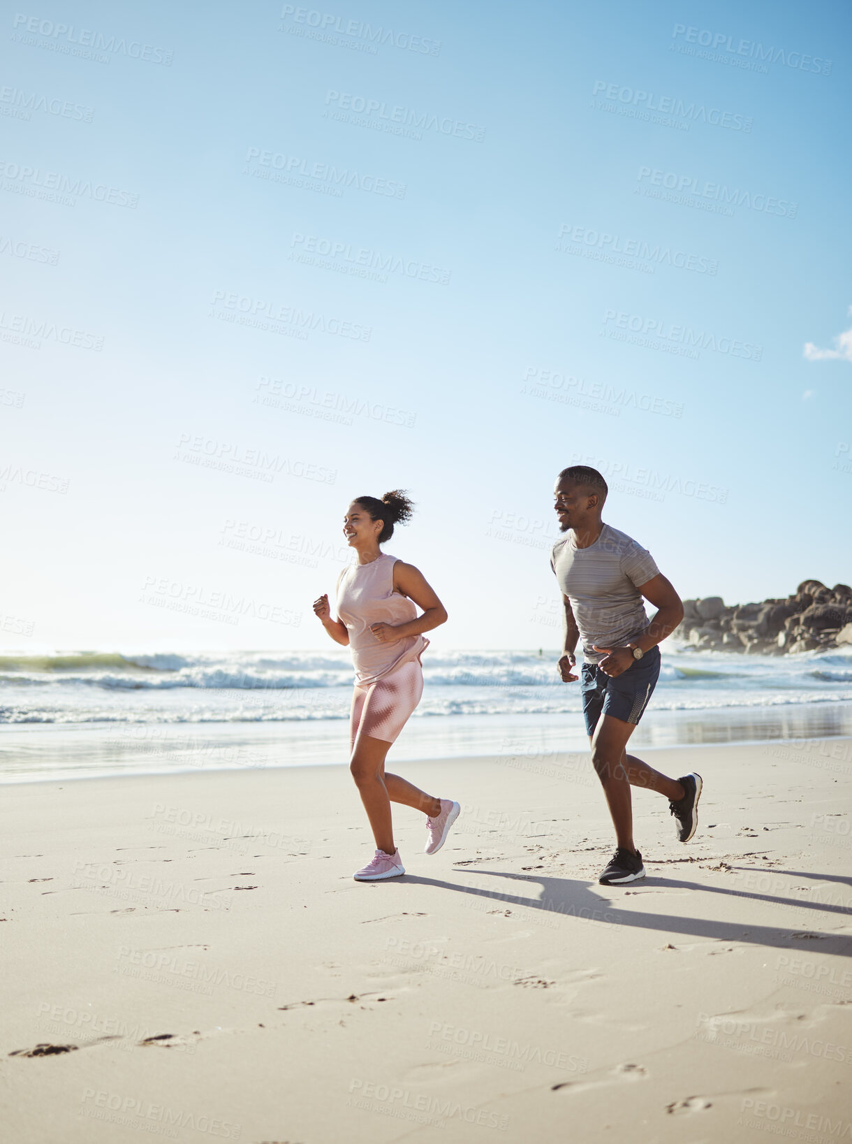 Buy stock photo Beach, couple running and cardio fitness training or wellness challenge together. Friends, sports teamwork run and healthy runner lifestyle motivation for energy or exercise workout on ocean sand