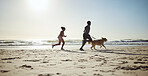 Fitness, couple and dog at beach for running, health and exercise in nature, sand and blue sky background. Ocean, workout and woman with man on cardio run with pet labrador, training and wellness 