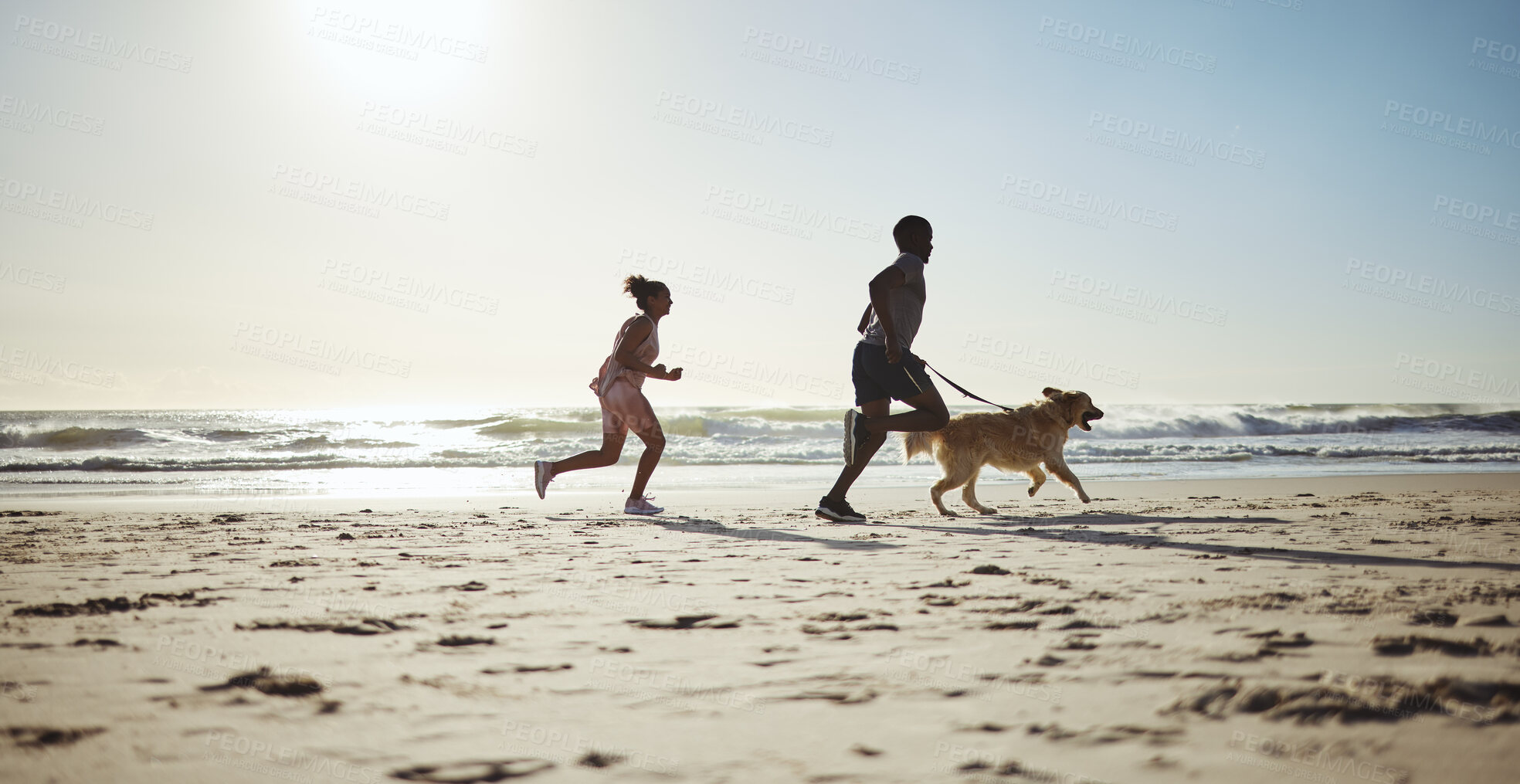 Buy stock photo Fitness, couple and dog at beach for running, health and exercise in nature, sand and blue sky background. Ocean, workout and woman with man on cardio run with pet labrador, training and wellness 