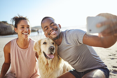 Buy stock photo Couple, phone selfie and dog on beach for social media post, video call or memory vlog by ocean, sea or water. Smile, happy or bonding black woman, man and golden retriever in mobile photography tech