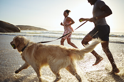 Buy stock photo Exercise, running and couple with their dog on the beach for a cardio workout for sport training. Fitness, sports and healthy man and woman doing a wellness workout with their pet by the ocean or sea