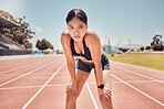 Runner, race track and woman in portrait for competition training, running event or marathon at a stadium on blue sky mock up. Focus, motivation and tired athlete girl with fitness and workout race